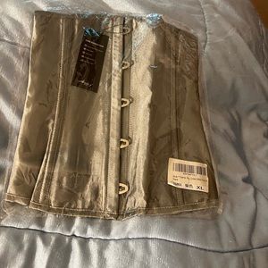 Women’s Corset in Grey. Size XL fits  32-36C-DD.Sealed packaging.